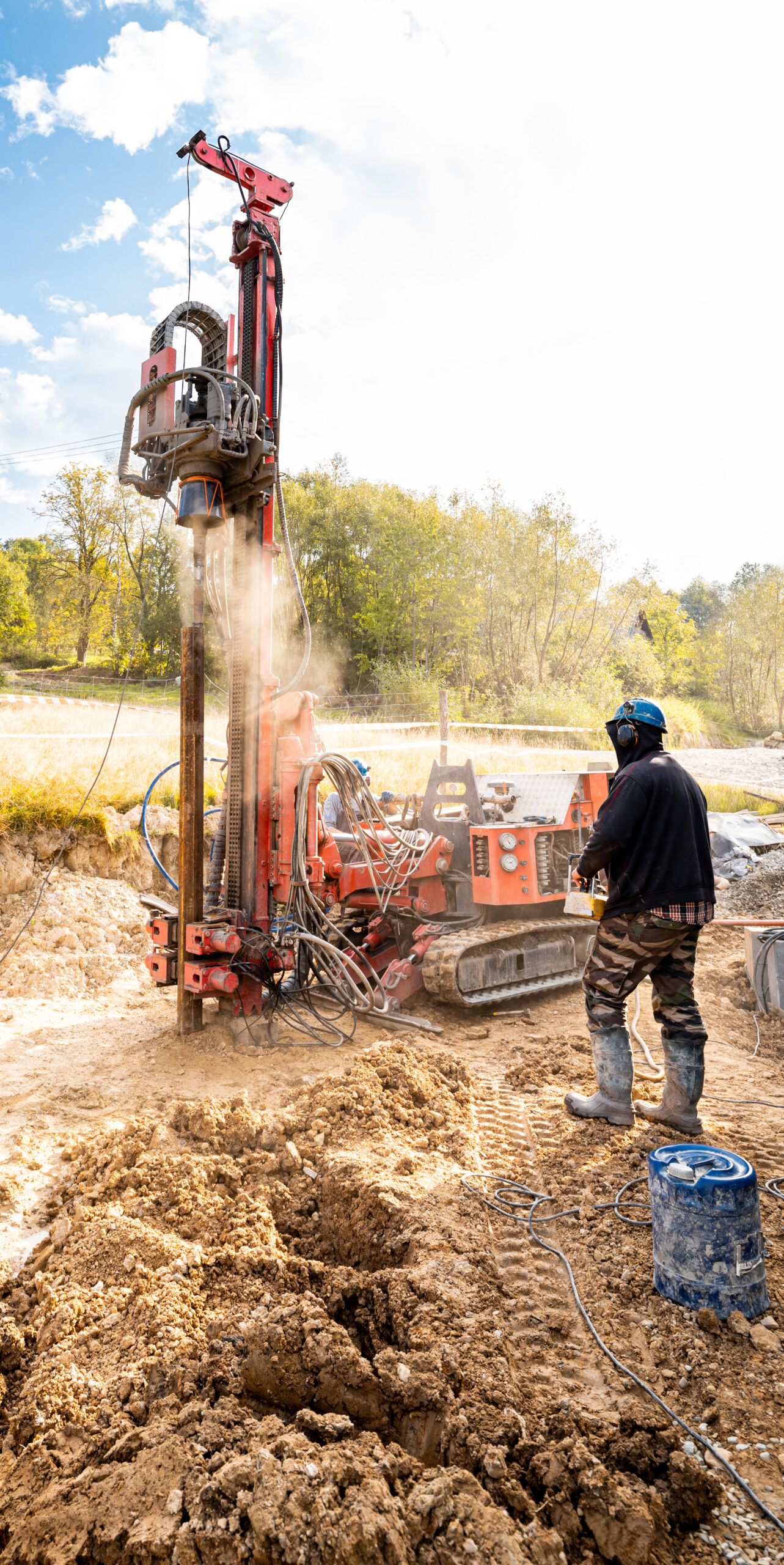 Drilling wells in the ground using a professional drill and machine